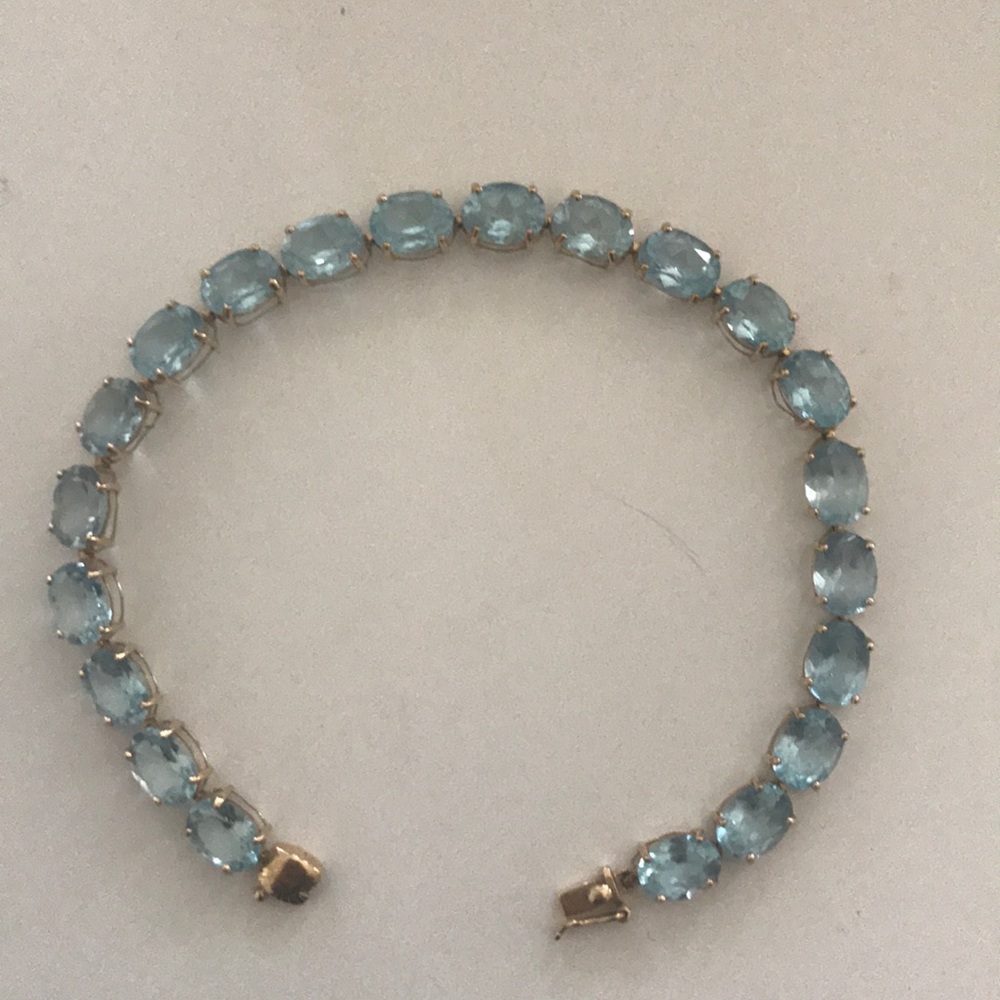 Precious aquamarine and 14k gold tennis bracelet